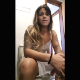A pretty, Hispanic girl is recorded farting and shitting while sitting on a toilet in at least 4 scenes. Vertical format video. Over 6 minutes.